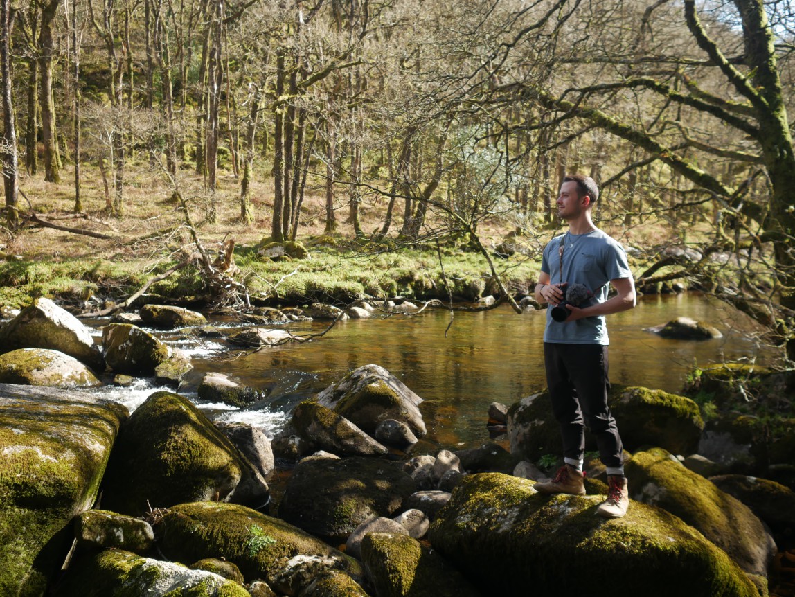 Louis Taylor of Whole Earth Film Production on set with his camera at Dartmoor National Park, UK